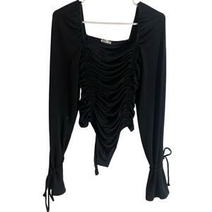Long-sleeved Black Free People ruched babydoll top blouse bodysuit